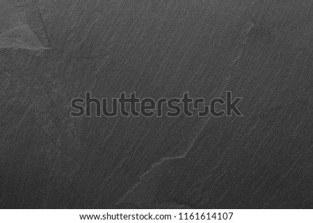 Dark grey black slate background or texture. black stone