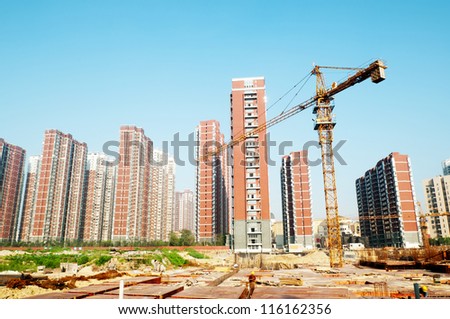 building under construction with workers