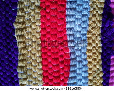 Colorful Multicolor Abstract background of the Fabric. Abstract background of Red, Purple, Pink, Blue, Green, Yellow and Golden color. 