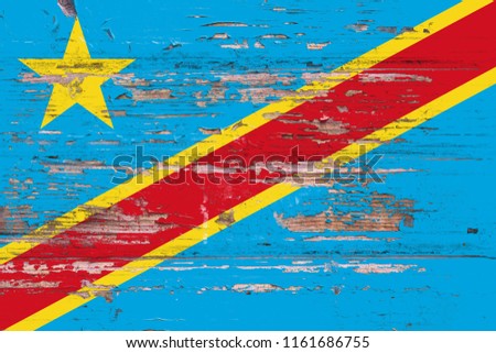 National flag of  Democratic Republic of the Kongo  on a dull wooden background