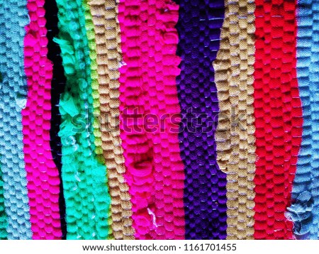 Colorful Multicolor Abstract background of the Fabric. Abstract background of Red, Purple, Pink, Blue, Green, Yellow and Golden color. 