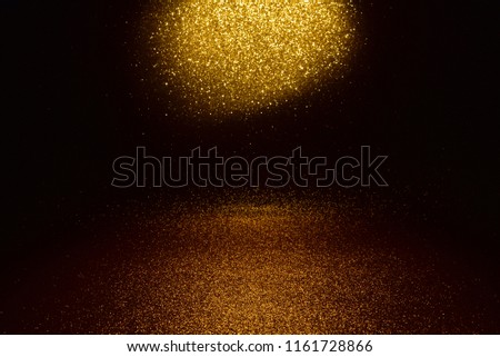 Gold glitter vintage lights texture background. defocused - studio