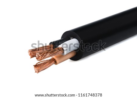 Electrical power cable on white background. Copper wire is the electric conductor of urban society. Royalty-Free Stock Photo #1161748378