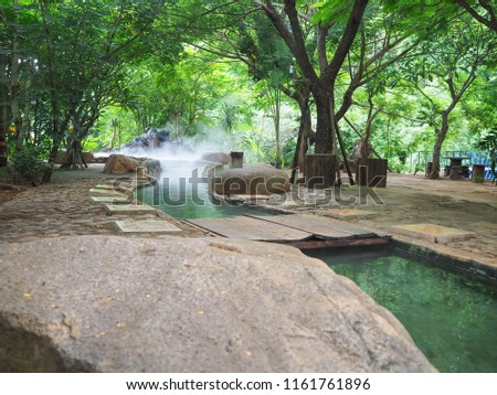Beautiful and shady  foot soak onsen, at Mae Khachan Hot Spring in Mae Khachan district, Chiang Rai, Thailand Royalty-Free Stock Photo #1161761896