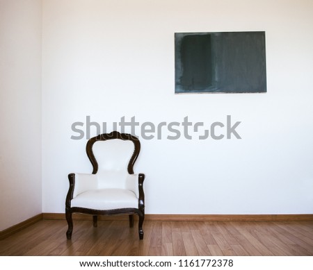 Empty room with armchair and white wall. Abstract accommodation. Minimalism in lodging.