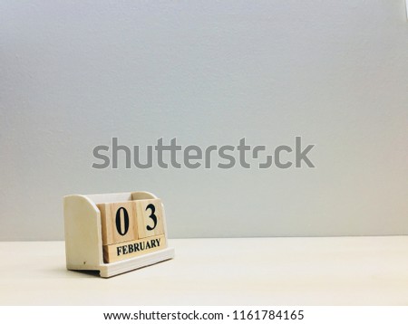 February 3rd,Image of number 3 wooden on grey and light brown color background with space for your text and design.Concept be used for birthday, appointment and deadline.Blur picture and vintage style