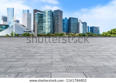 Blue sky, empty marble floor and skyline of Hangzhou urban archi