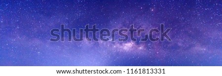 Panorama Colorful Blue night sky milky way and star on dark background.Universe filled with stars, nebula and galaxy with noise and grain.Photo by long exposure and select white balance.