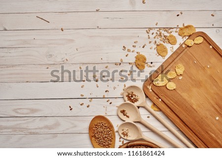 wooden board and spoons on the table                              