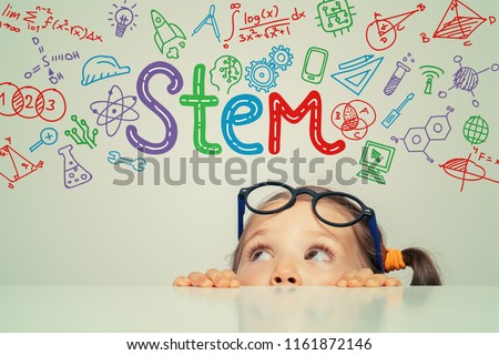STEM word and symbols over beautiful cute little girl. modern education concept Royalty-Free Stock Photo #1161872146