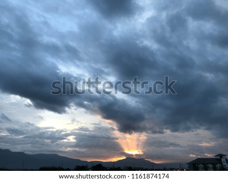 Dramatic orange grey purple sky and cloudy at sunset for background