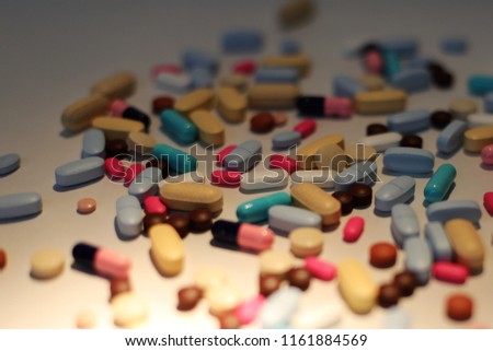 A variety of Medicine scattered on the counter.