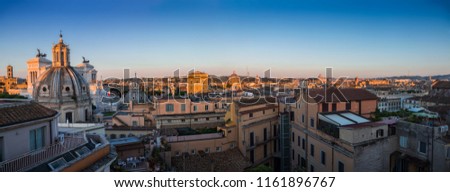 Beautiful panoramic view of the historical architecture of Rome from the roof of the building-Forum, Catholic churches and churches, Vatican, Pantheon and other attractions in the morning sun