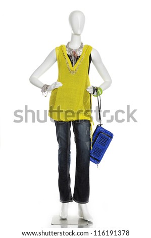 female clothing in jeans with bag on mannequin