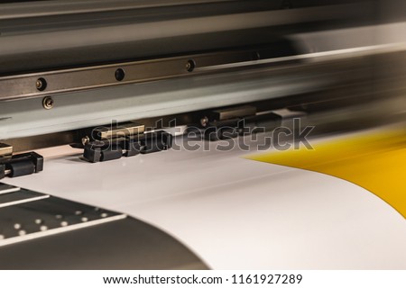 Elements from the production chain within a massive printing facility, newspaper, magazine, billboards, and any commercial print is made here.  Royalty-Free Stock Photo #1161927289