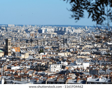 Cityscape view of Paris in France, Montmartre. View of Paris in summer day. Roofs in residential quarters