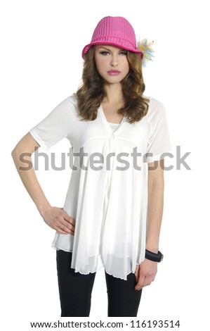 portrait of young woman standing in hat isolated on white background.