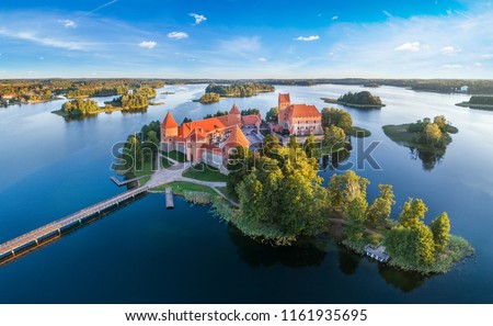 Trakai castle: medieval gothic Island castle, located in Galve lake. Flat lay of the most beautiful Lithuanian landmark. Trakai Island Castle - one of the most popular tourist destination in Lithuania Royalty-Free Stock Photo #1161935695
