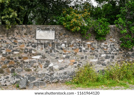 Ancient ruins in Rome (Italy) -  Name plate Via Appia (Appian Way)