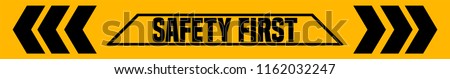 Safety First Industrial Tape Sign. Royalty-Free Stock Photo #1162032247