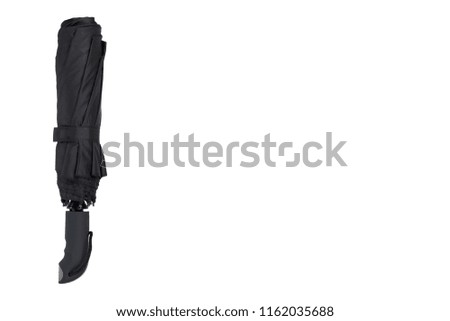Single closed black umbrella isolated on a white background, copy space template
