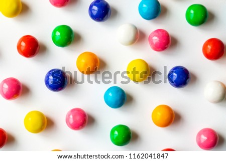 A variety of gumballs with different colors shot on a white background Royalty-Free Stock Photo #1162041847