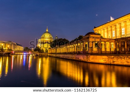 Illuminated colorful night view of  Berlin with Berlin Cathedral Berliner Dom in background.
