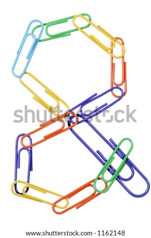 Paperclips arranged into the shape of the and or ampersand symbol.