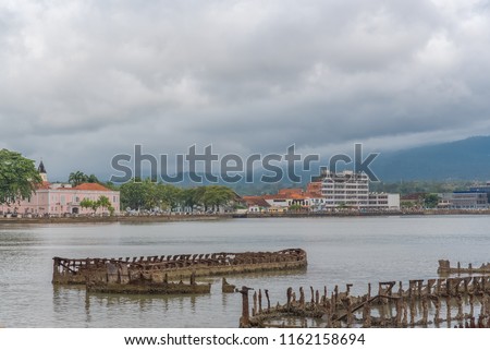 Sao Tome and Principe, panorama of the capital Sao Tome in the bay, with ship wreck
 Royalty-Free Stock Photo #1162158694