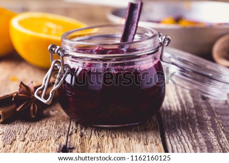 Cranberry sauce prepared  in rural pan ready to eat, rustic style