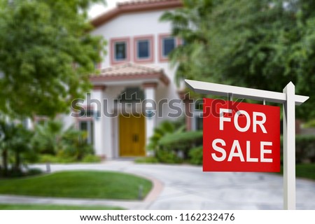 Real estate sign in front of new