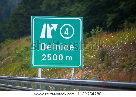 Exit sign to Delnice town on the highway in Delnice, Croatia