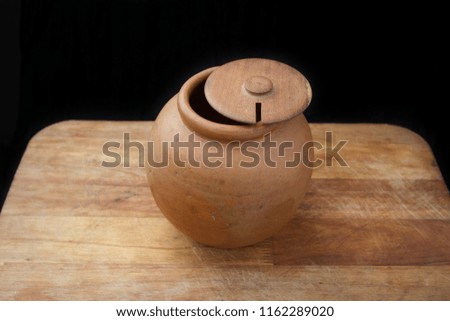 A ceramic brown bowl like the one that appears in the cartoons