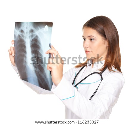 Young female doctor looking at the x-ray picture of lungs isolated on white background
