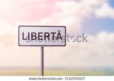 FREEDOM - white traffic sign with inscription in italian