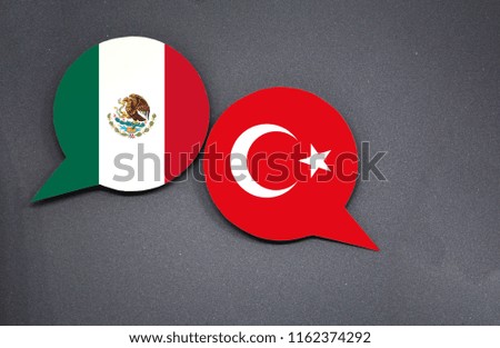 Mexico and Turkey flags with two speech bubbles on dark gray background