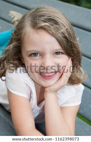 portrait of cute beauty kid girl blond child smile 