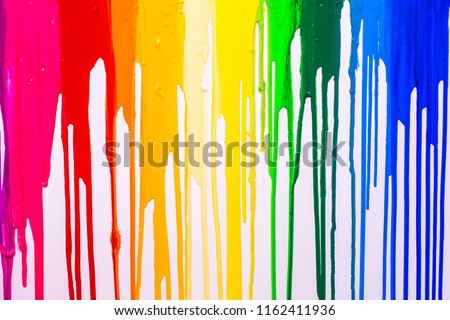 rainbow cilors of screen print colors are dripping in white background