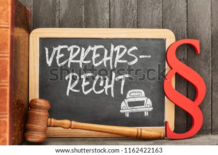 German word Verkehrsrecht (traffic law) as concept on a blackboard