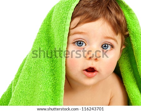 Image of cute baby boy covered with green towel isolated on white background, closeup portrait of cheerful kid with blue eyes, health care, pretty infant after bath, happy childhood, child's hygiene Royalty-Free Stock Photo #116243701