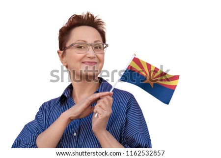 Arizona flag. Woman holding Arizona state flag. Nice portrait of middle aged lady 40 50 years old with a state flag isolated on white background.