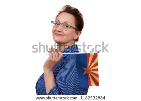 Arizona flag. Woman holding Arizona state flag. Nice portrait of middle aged lady 40 50 years old with a state flag isolated on white background.