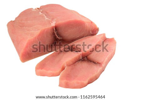 Sliced Swordfish fillet, isolated on white. Royalty-Free Stock Photo #1162595464