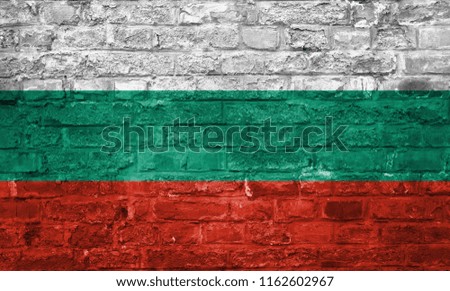 Flag of Bulgaria over an old brick wall background, surface