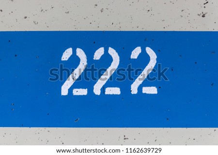 Number 222 over cement park number