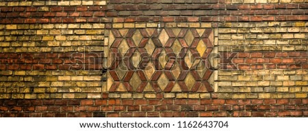 Texture of an ornament from an old brick. Background