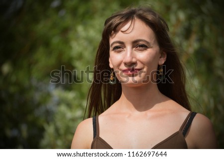 Young woman happy in woods