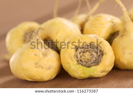 Fresh maca roots or Peruvian ginseng (lat. Lepidium meyenii) which are popular in Peru for their various health effects (Selective Focus, Focus on the maca roots in the front) Royalty-Free Stock Photo #116273587