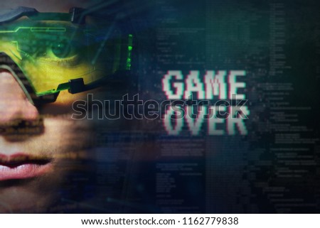 Portrait of a boy with green glasses from real professional gamer and on the graphic background in holography. Concept of: online games, future, technology