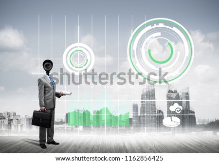 Businessman with camera instead of head and media user interface on screen